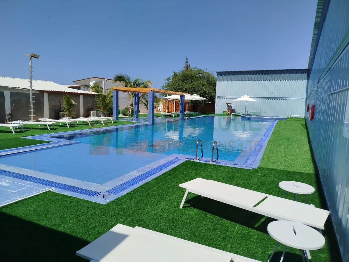Private swimming pool with paved surround