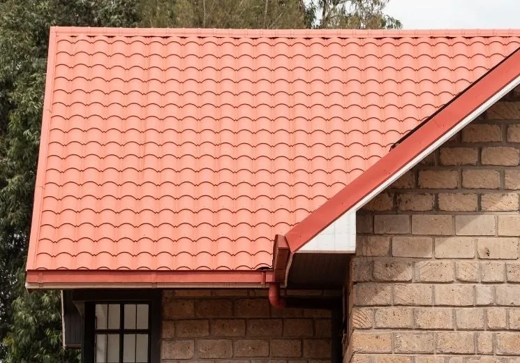 House re-roofed with red tile-profile sheets